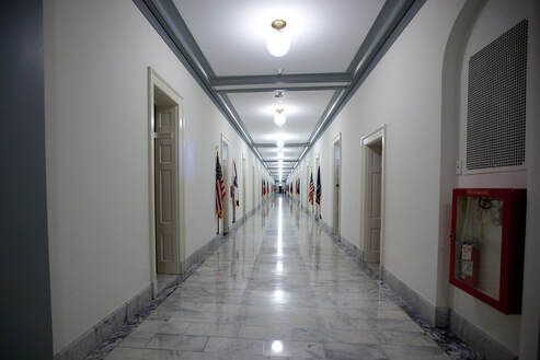 Picture a Hallway in a State owned Government building after LED Light Retrofit